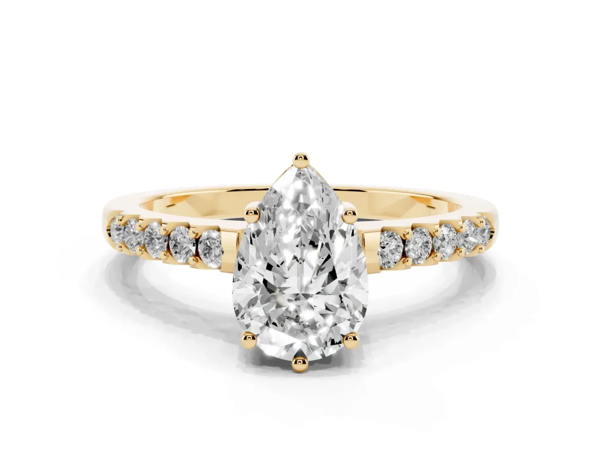 Pear Cut Solitaire Diamond Engagement Ring with Pavé Band and Six-Prong Setting Yellow gold