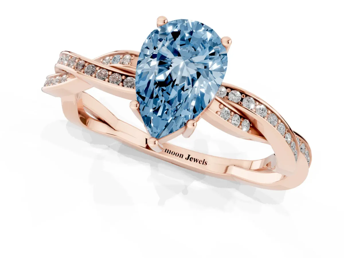 Fancy Blue Pear Cut Solitaire Twisted Pave Diamond Ring with Four-Prong Setting Rose gold