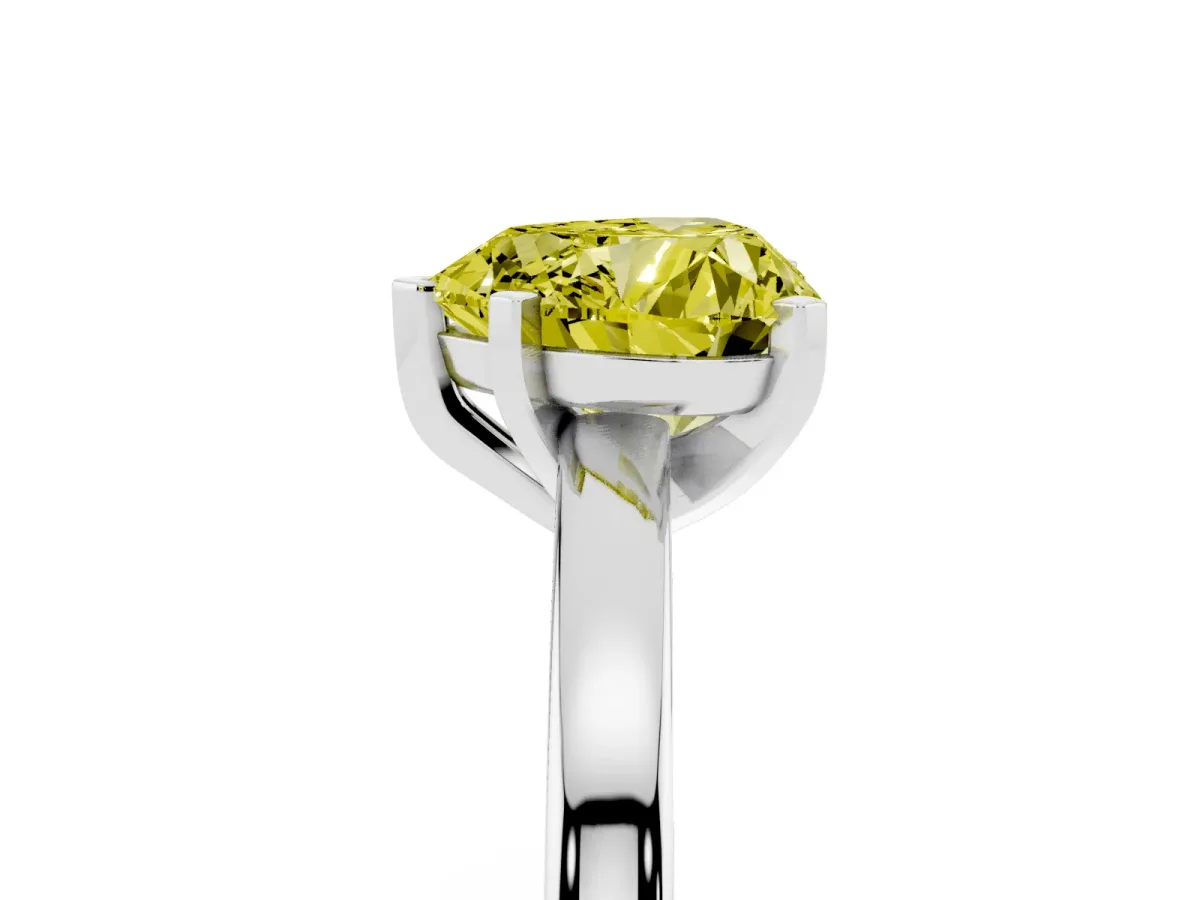 Fancy Yellow Heart Cut Solitaire Diamond Engagement Ring with Four-Prong Setting on a Classic Band Platinum