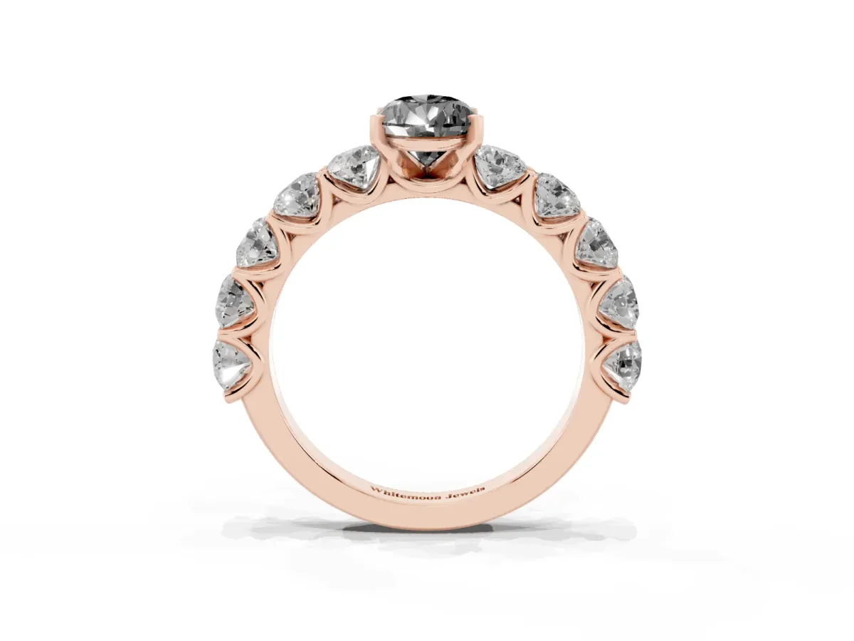 Fancy Black Pear Cut Diamond Prong Setting with Side Stones on a Pave Band Rose gold