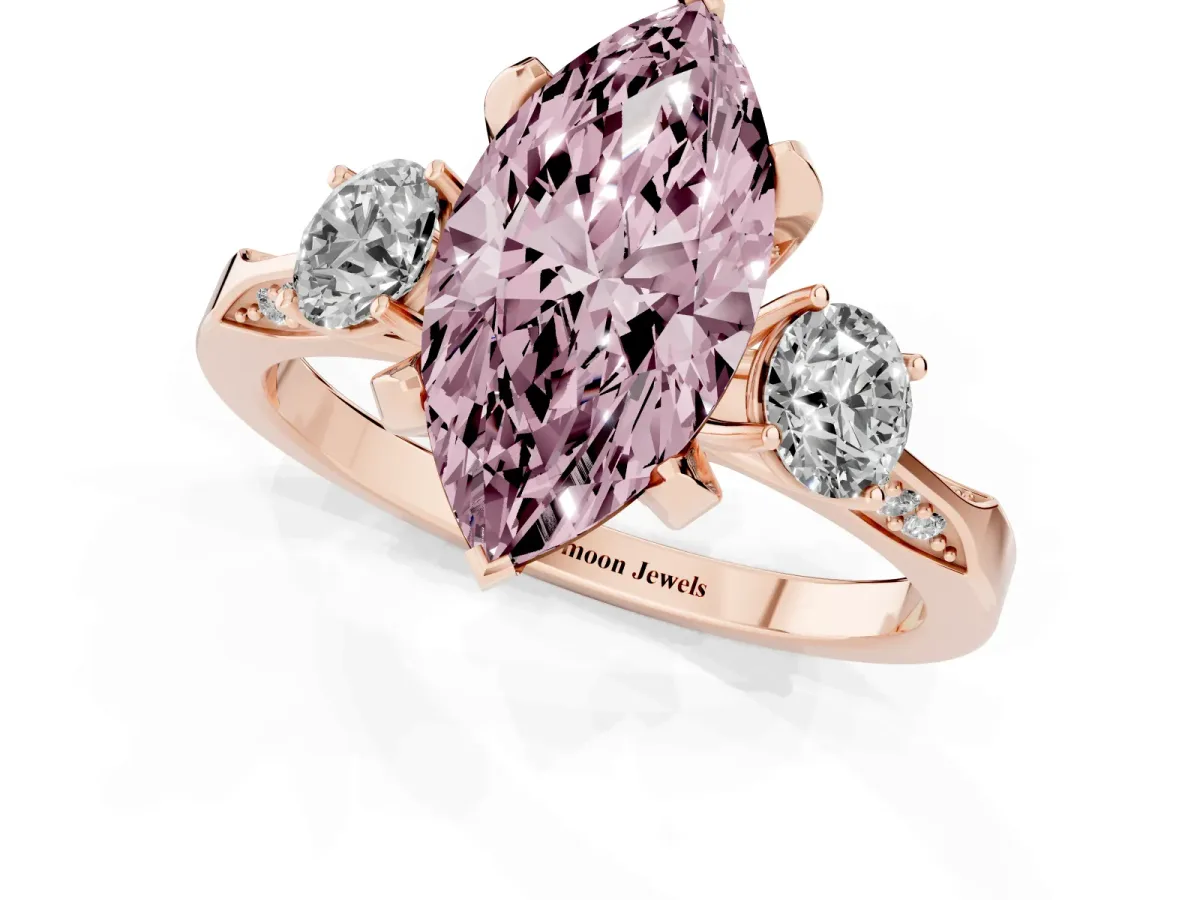 Fancy Pink Marquise Cut Brilliant Three-Stone Diamond Ring with Pavé Band and Four-Prong Setting Rose gold