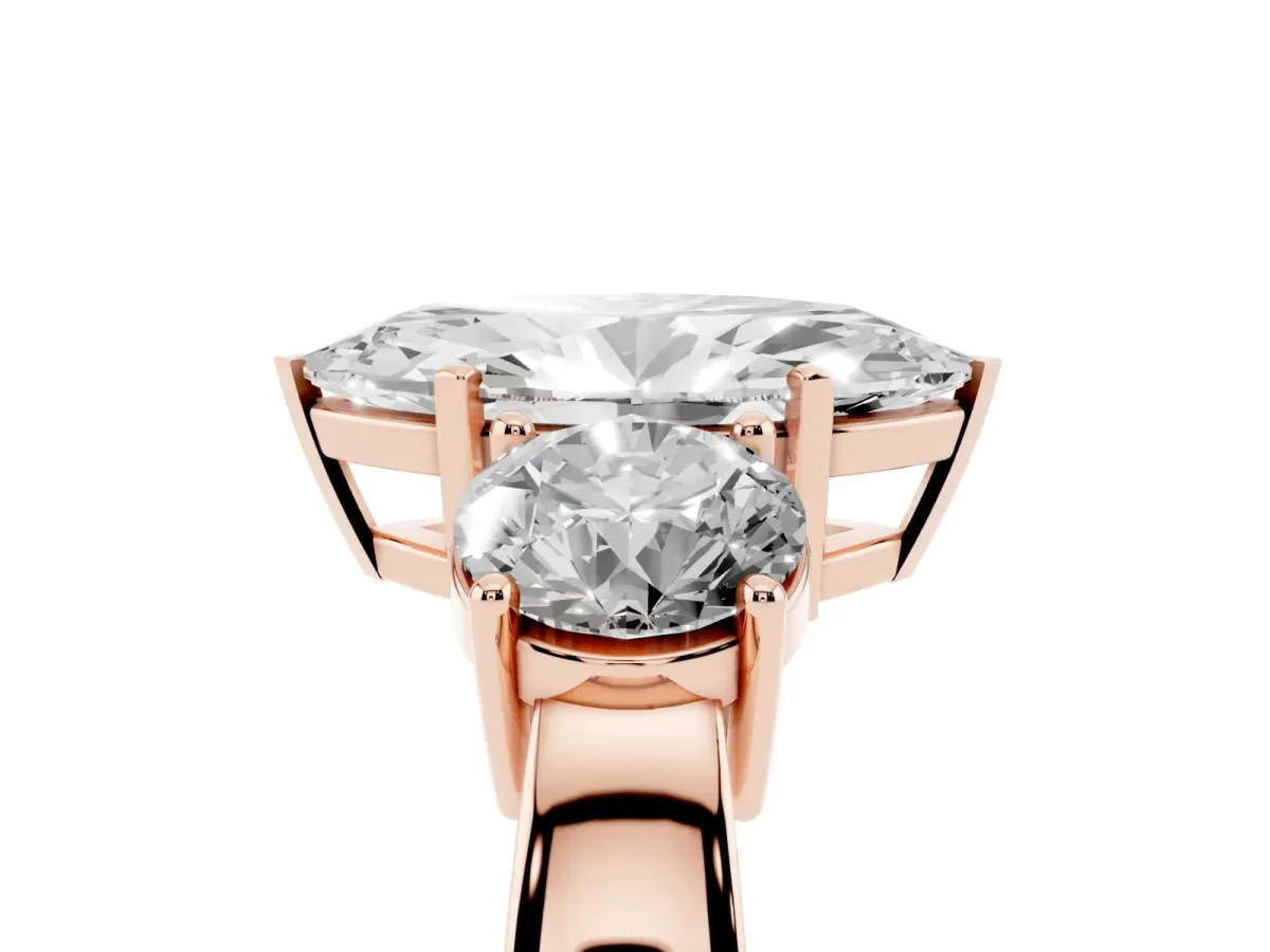 Three-Stone Marquise Cut Diamond Ring with Round Side Stones, Classic Band, and Four-Prong Setting Rose gold