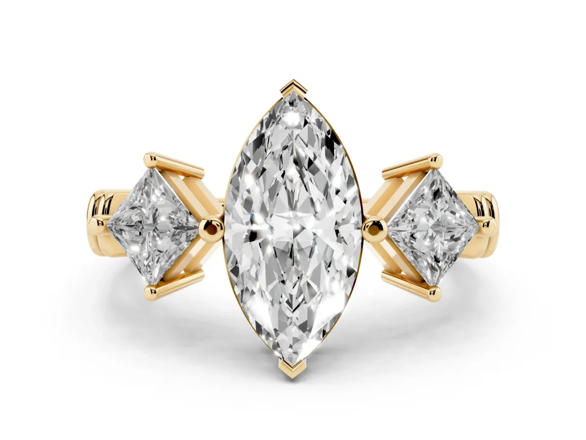 Three-Stone Marquise Cut and Princess Cut Diamond Ring with Channel Band and Four-Prong Setting Yellow gold