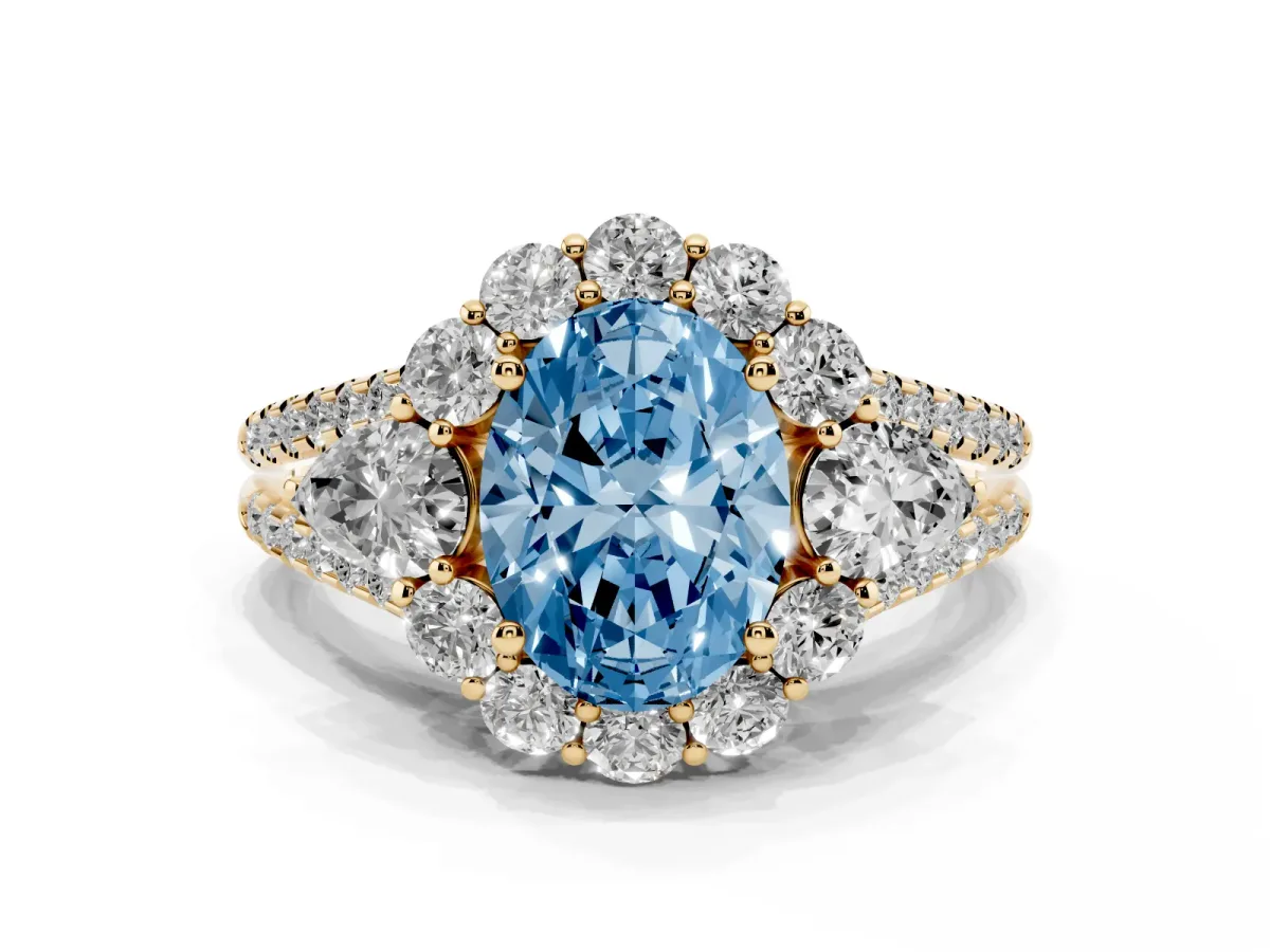 Fancy Blue Oval Cut Halo Split Shank Diamond Engagement Ring with Prong Setting Yellow gold