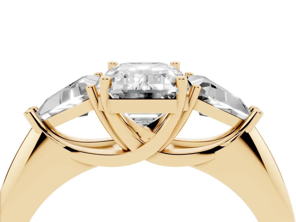 Three-Stone Emerald Cut Diamond Engagement Ring with Trillion Side Stones and Prong Setting Yellow gold