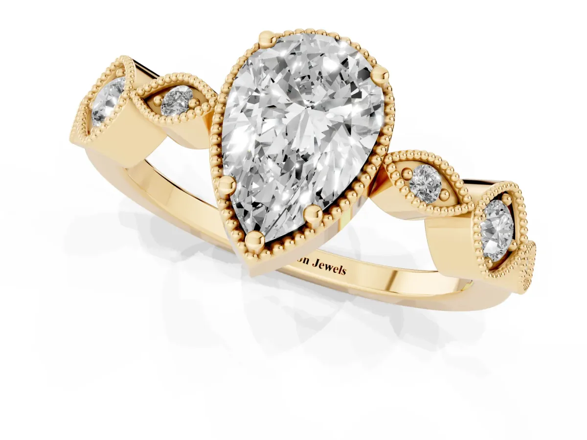 Pear Cut Diamond Vintage Milgrain Ring with Round Stations Yellow gold