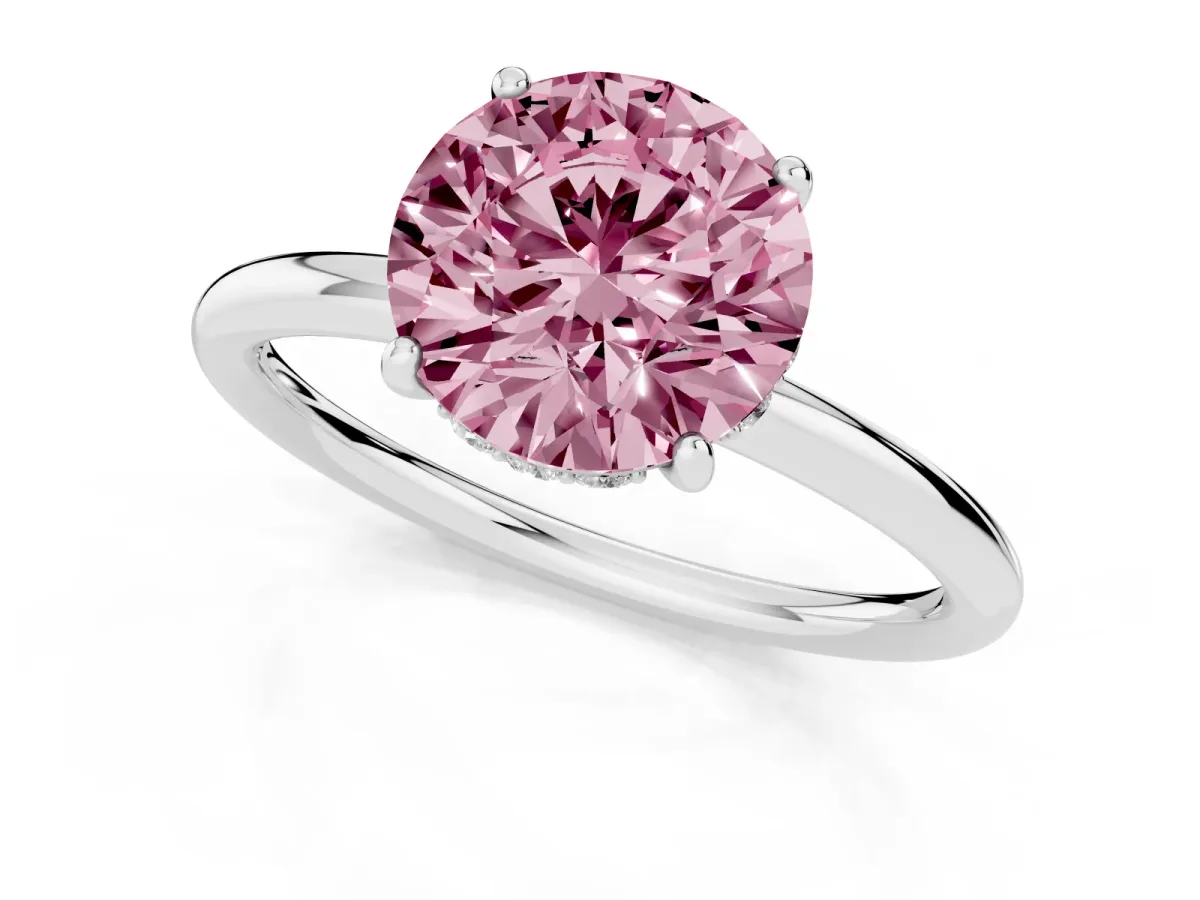 Fancy Pink Round Cut Solitaire Diamond Ring with a Classic Band and Four-Prong Setting Silver