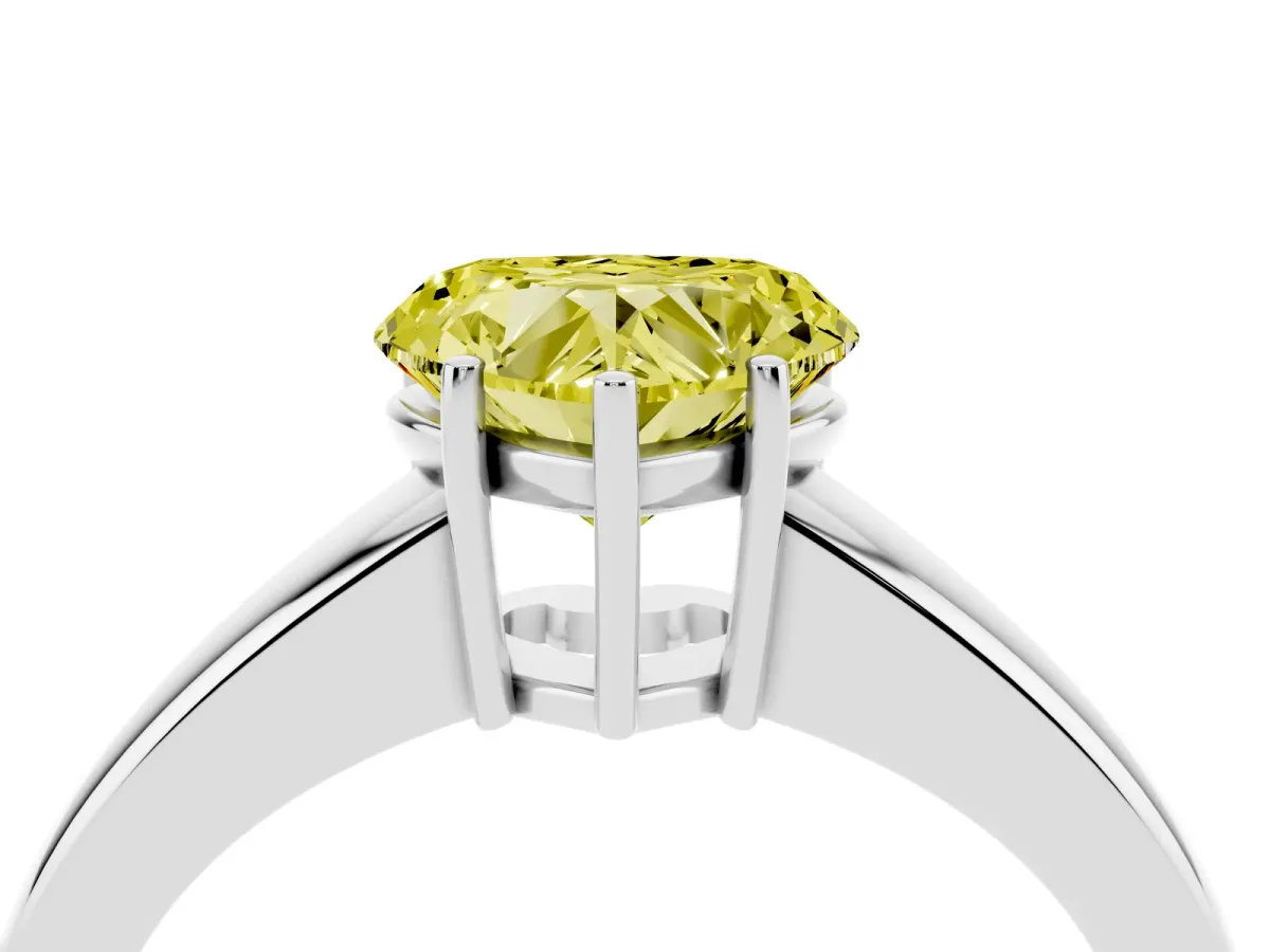 Fancy Yellow Heart Cut Solitaire Diamond Ring with Tapered Band and Four-Prong Setting Silver