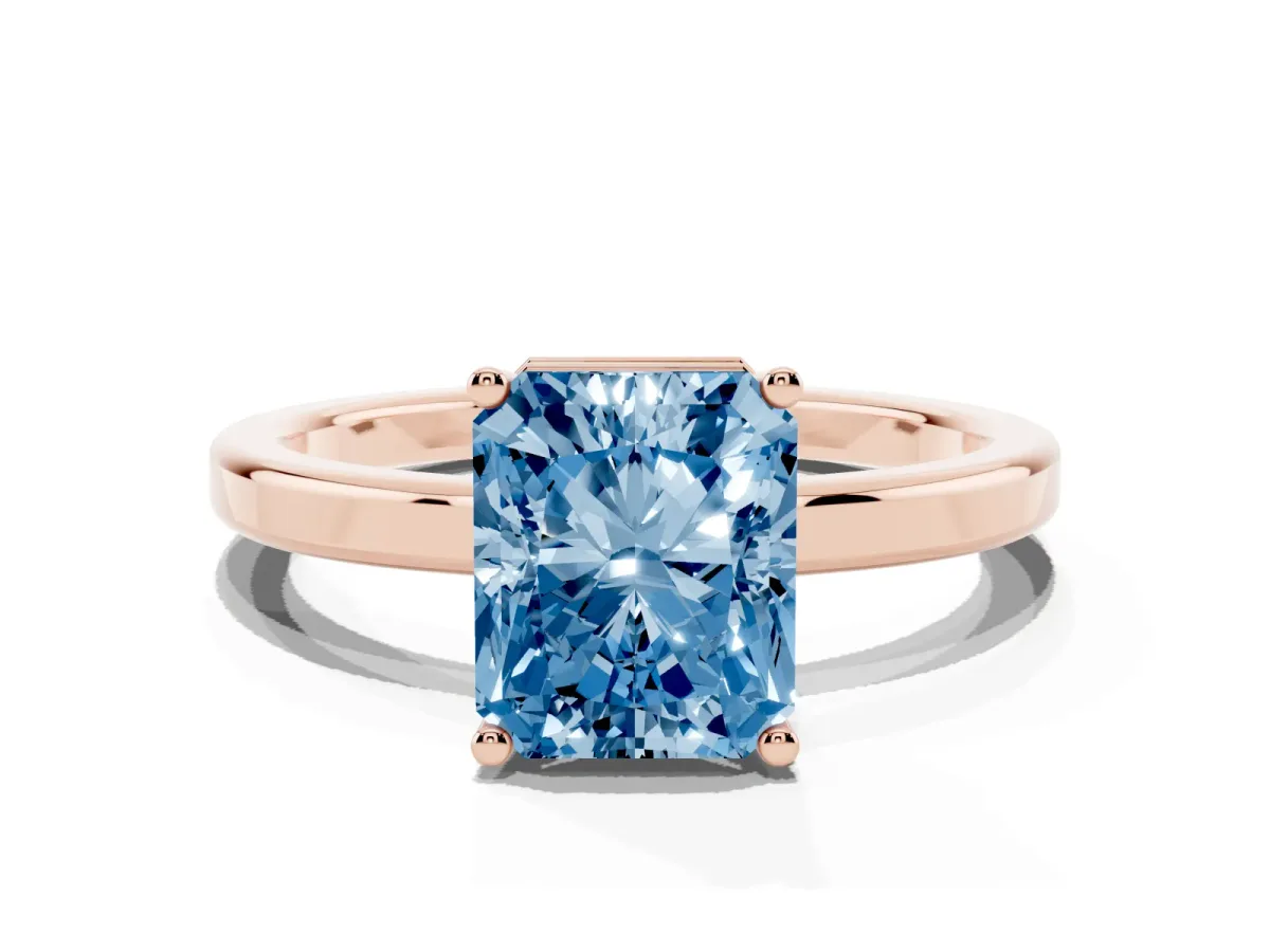 Fancy Blue Radiant Cut Cut Solitaire Engagement Ring with Four-Prong Setting on a Classic Band Rose gold