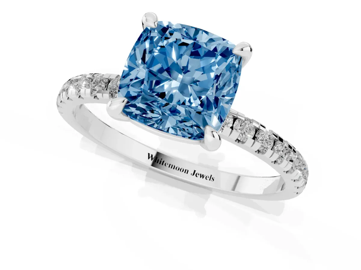 Fancy Blue Cushion Cut Diamond Brilliant Solitaire Ring with Pavé Band and Four-Prong Setting Silver