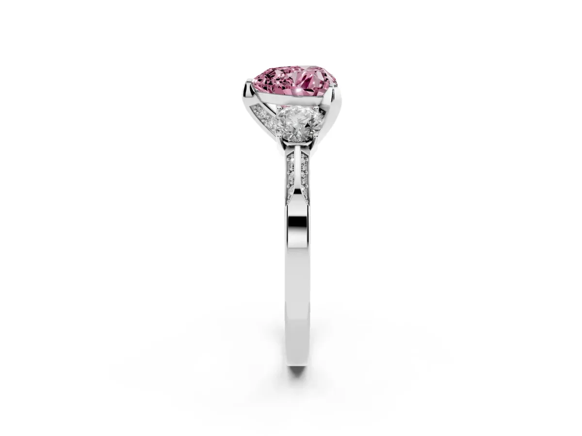 Fancy Pink Heart Cut Brilliant Three-Stone Diamond Ring with Pavé Band and Four-Prong Setting White gold