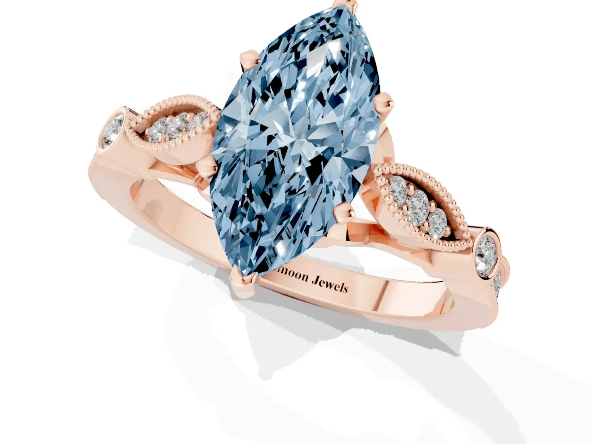 Fancy Blue Marquise Cut Cut Diamond with Milgrain Marquise and Bezel Accents on a Solitaire Band with Prong Setting Rose gold