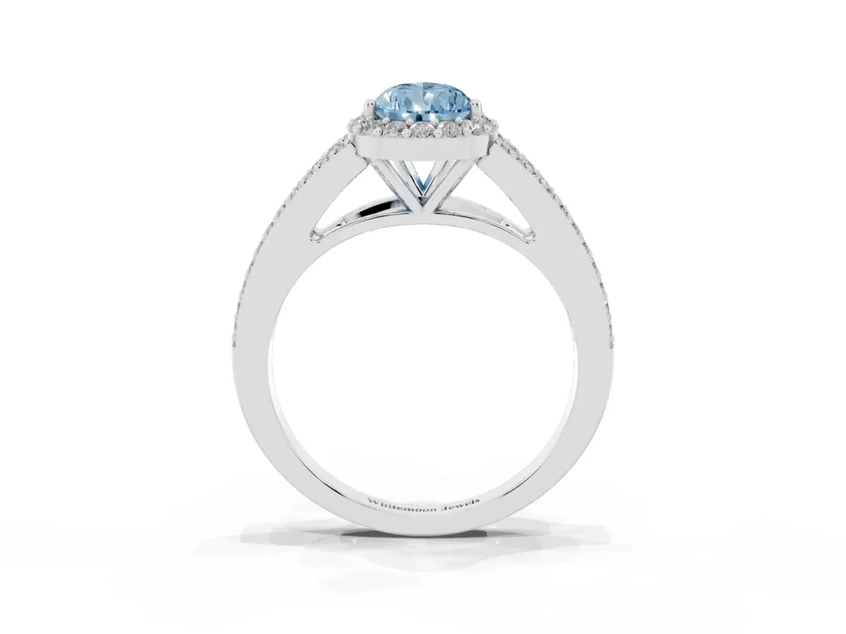 Fancy Blue Pear Cut Halo Split Shank Pave Diamond Ring with Four-Prong Setting Platinum