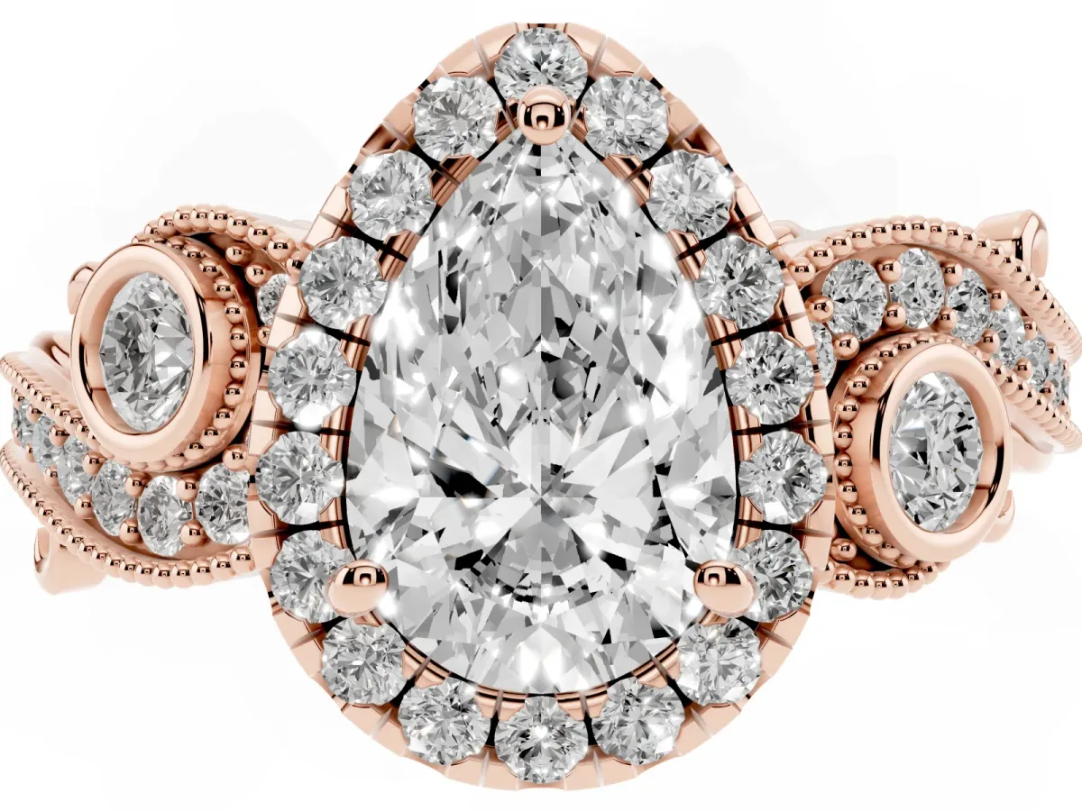 Pear Cut Halo Diamond Ring with Milgrain and Bezel Accents on a Split Shank Band Rose gold