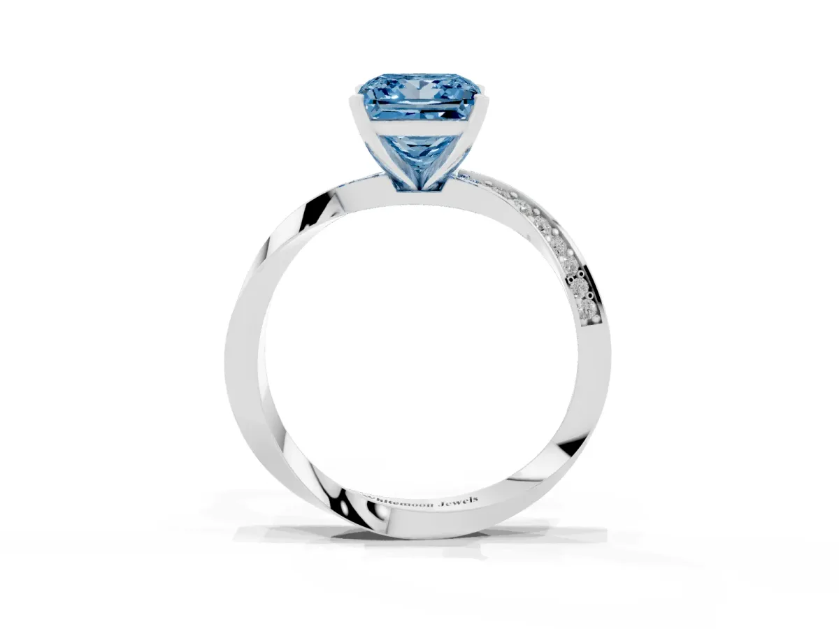 Fancy Blue Princess Cut Diamond Engagement Ring with Side Stone Accents and Four-Prong Setting Platinum