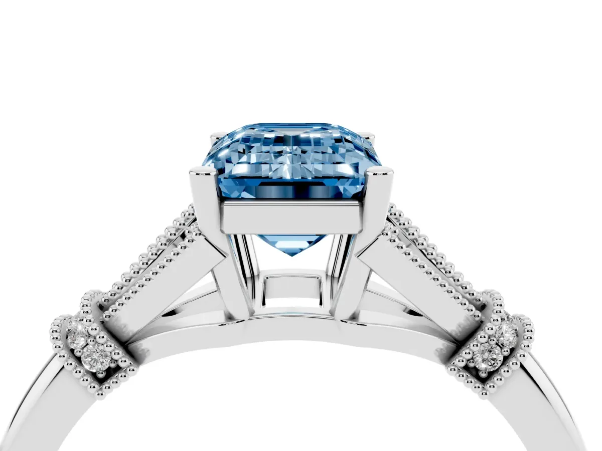 Fancy Blue Emerald Cut Diamond Solitaire Ring with Floral Filigree and Pave Accents White gold