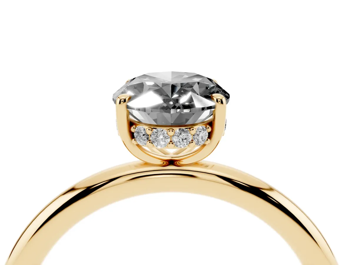 Fancy Black Oval Cut Diamond Solitaire Ring with Thin Band and Four-Prong Setting Yellow gold