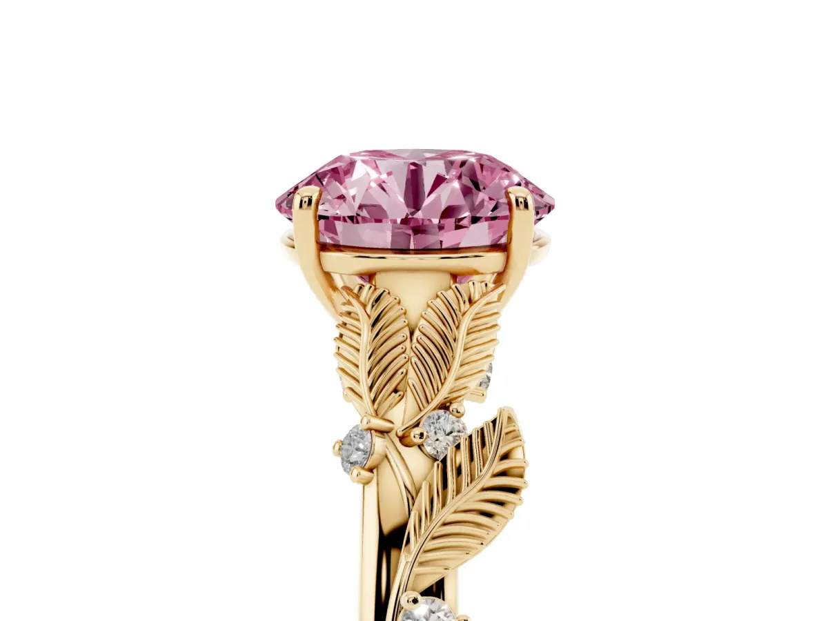 Fancy Pink Round Cut Diamond Solitaire Ring with Leaf Motif Band and Four-Prong Setting Yellow gold