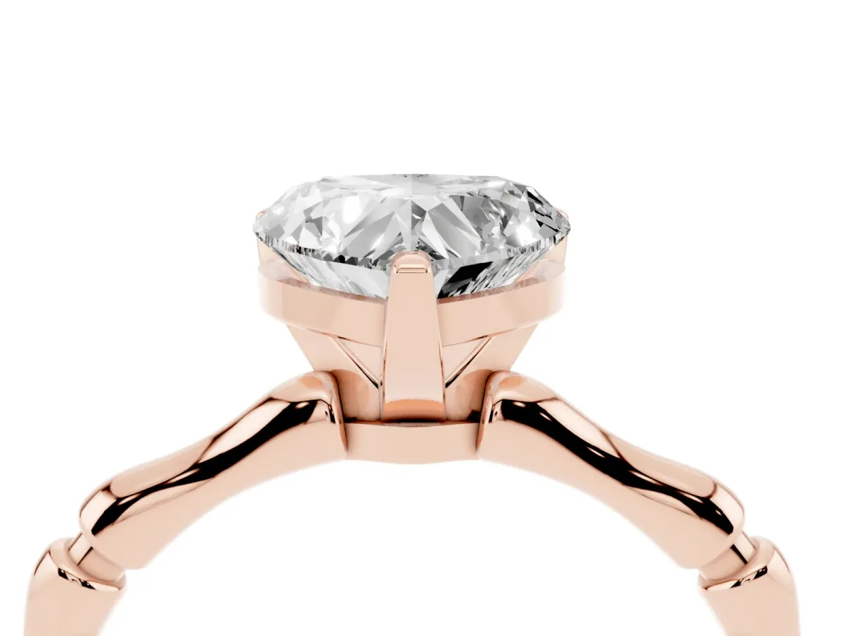 Heart Cut Solitaire Diamond Ring with Bamboo Band and Four-Prong Setting Rose gold