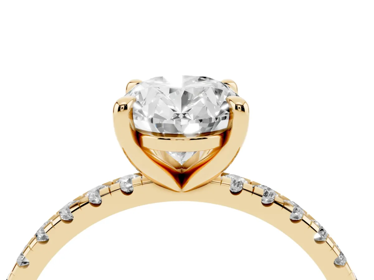 Oval Cut Diamond Brilliant Solitaire Ring with Pavé Band and Four-Prong Setting Yellow gold