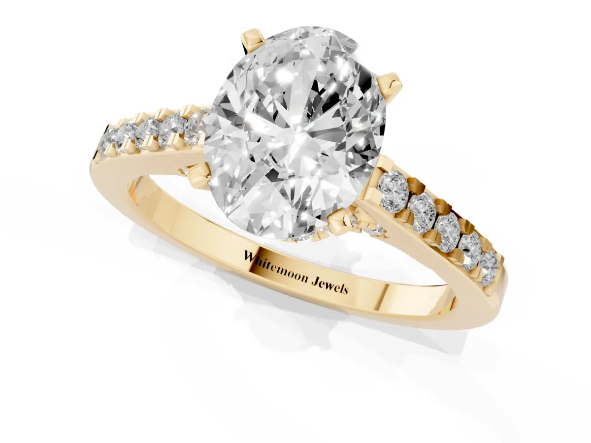 Oval Cut Diamond Solitaire Ring with Crossover Gallery and Round Pavé Band Yellow gold