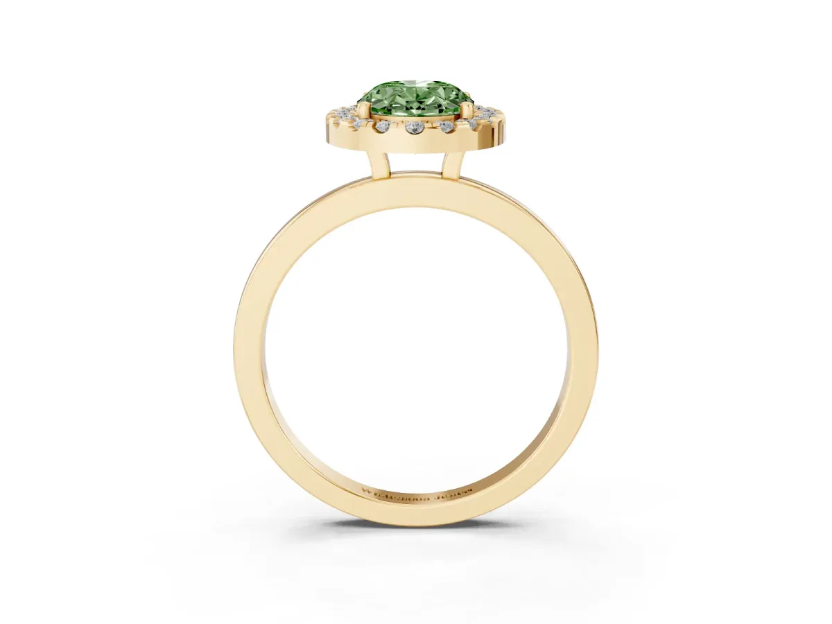 Fancy Green Oval Cut Halo Diamond Solitaire with Pavé Band and Four-Prong Setting Yellow gold