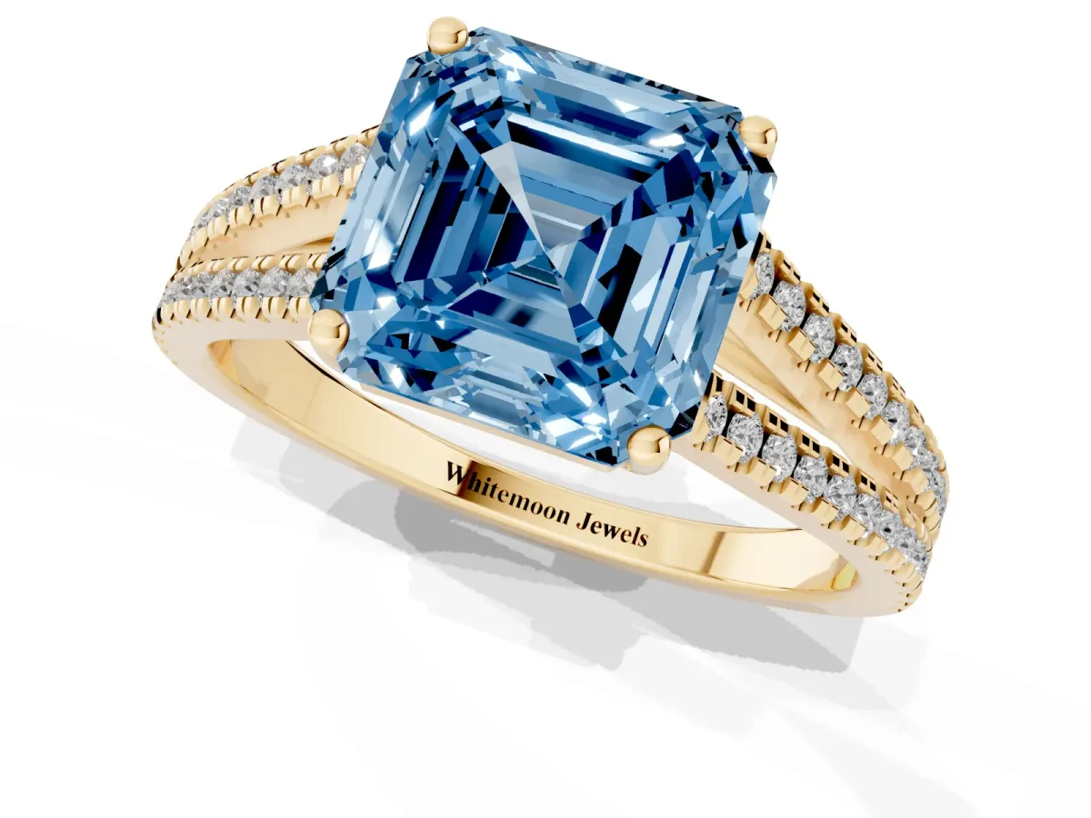 Fancy Blue Asscher Cut Diamond Solitaire Engagement Ring with Split Shank Pavé Band Yellow gold