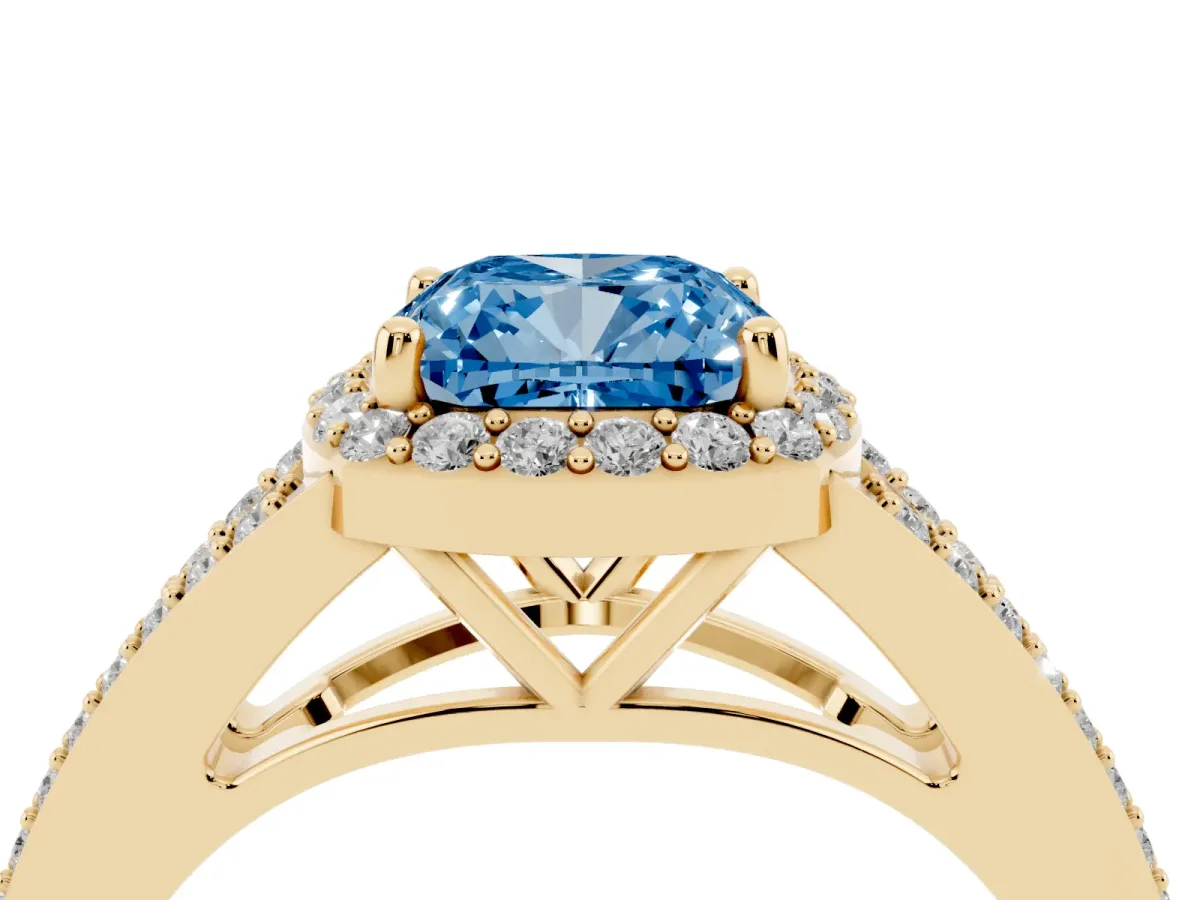 Fancy Blue Cushion Cut Halo Split Shank Pave Diamond Ring with Four-Prong Setting Yellow gold