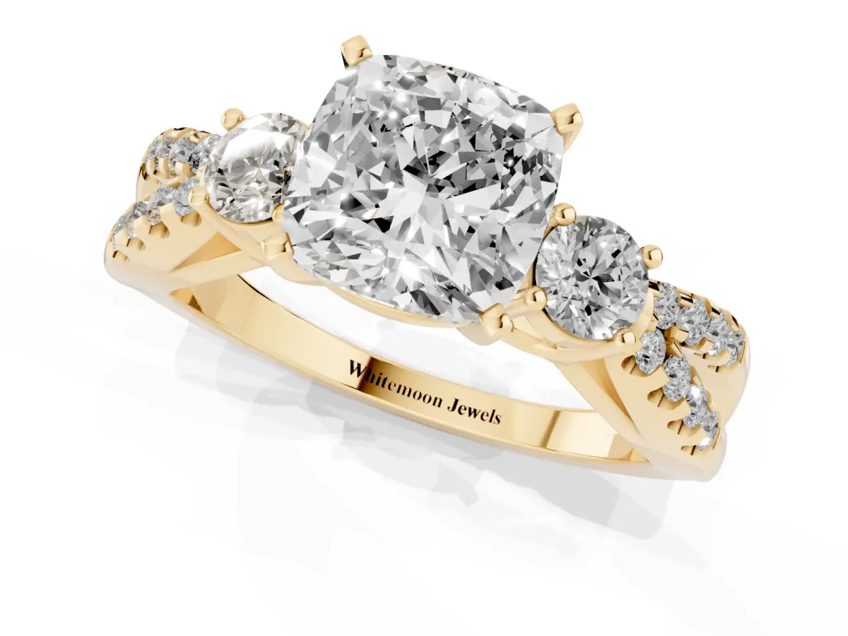 Cushion Cut Diamond Three-Stone Ring with Pavé Split Shank and Four-Prong Setting Yellow gold