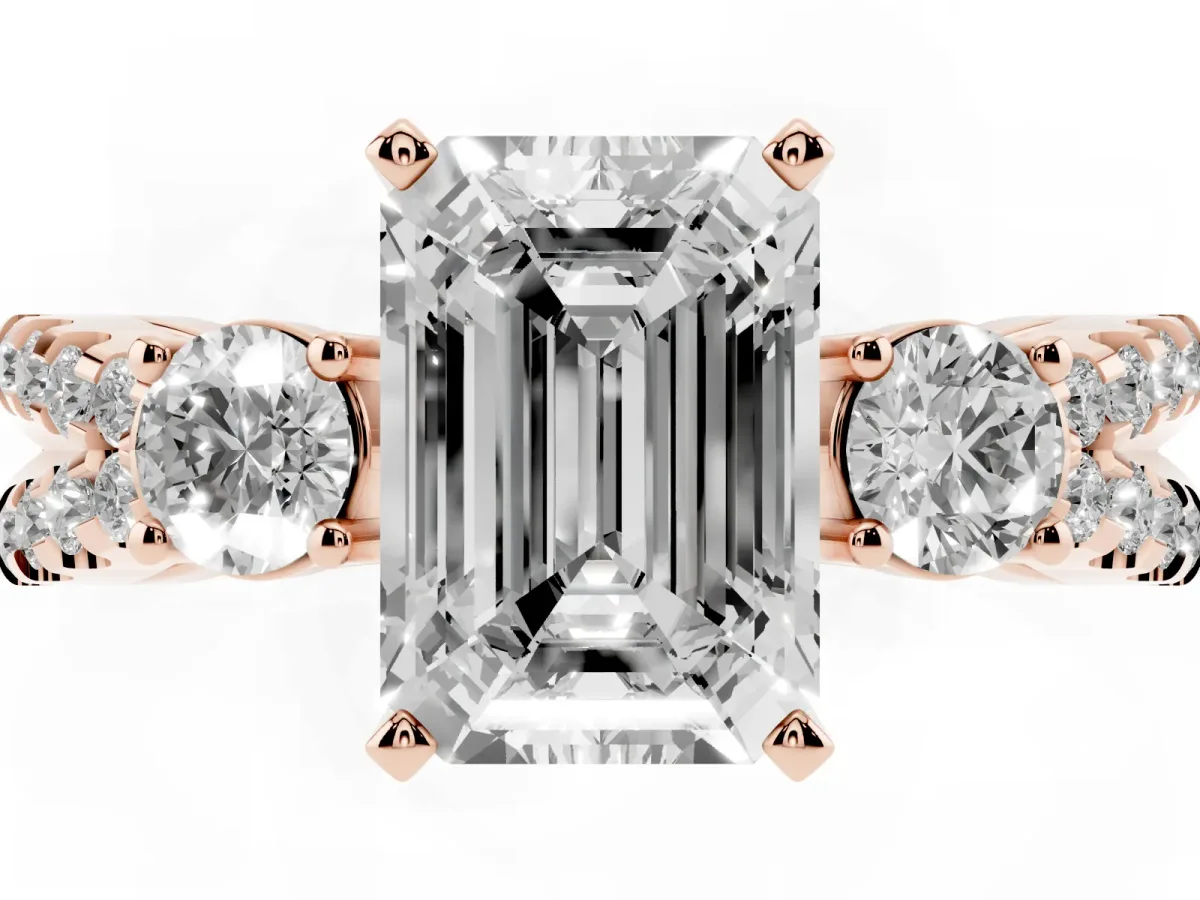 Emerald Cut Diamond Three-Stone Ring with Pavé Split Shank and Four-Prong Setting Rose gold