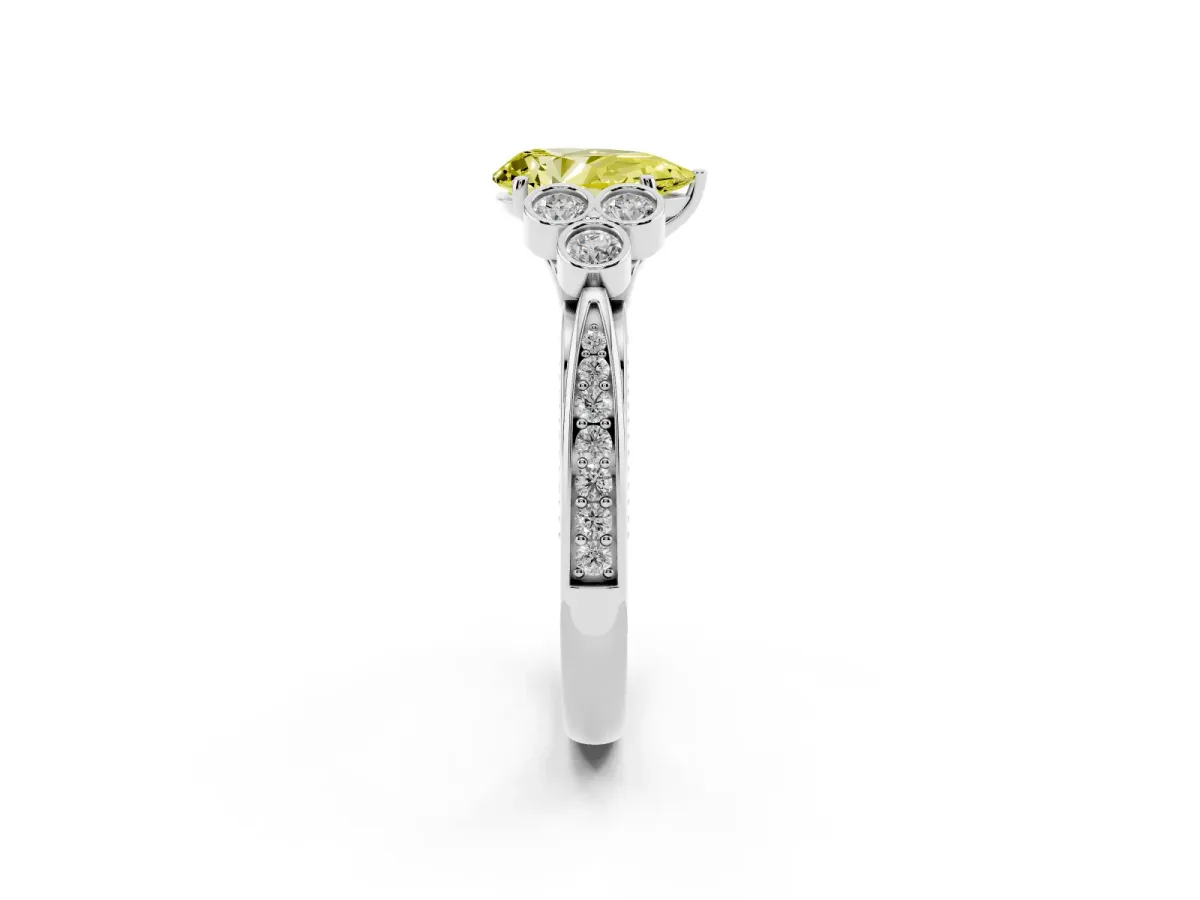 Fancy Yellow Pear Cut Cut Diamond Engagement Ring with Bezel Set Round Side Stones and Prong Setting Silver