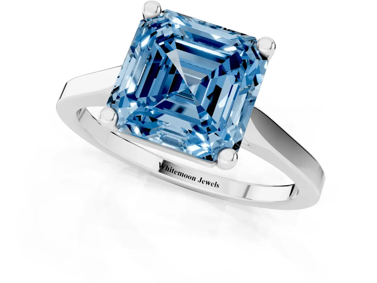 Fancy Blue Asscher Cut Solitaire Diamond Ring with Four-Prong Setting and Tapered Band Silver