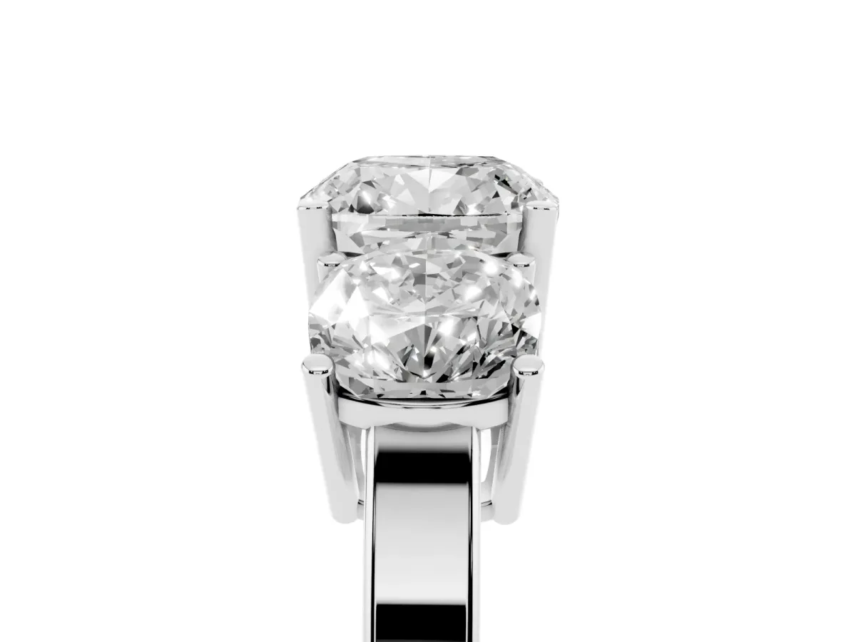 Three-Stone Cushion Cut Cut Diamond Engagement Ring with Flat Band and Four-Prong Setting Silver