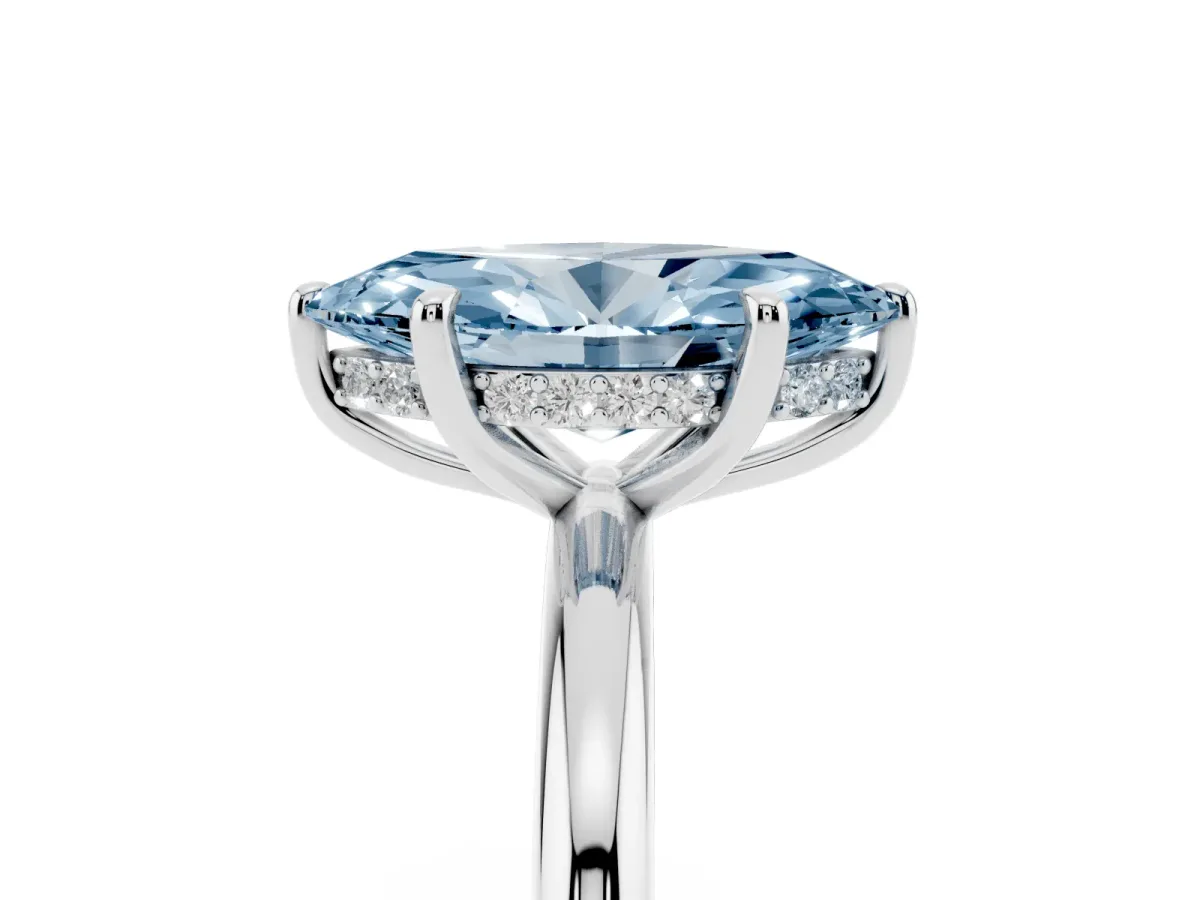 Fancy Blue Marquise Cut Diamond Solitaire Ring with Thin Band and Four-Prong Setting Silver