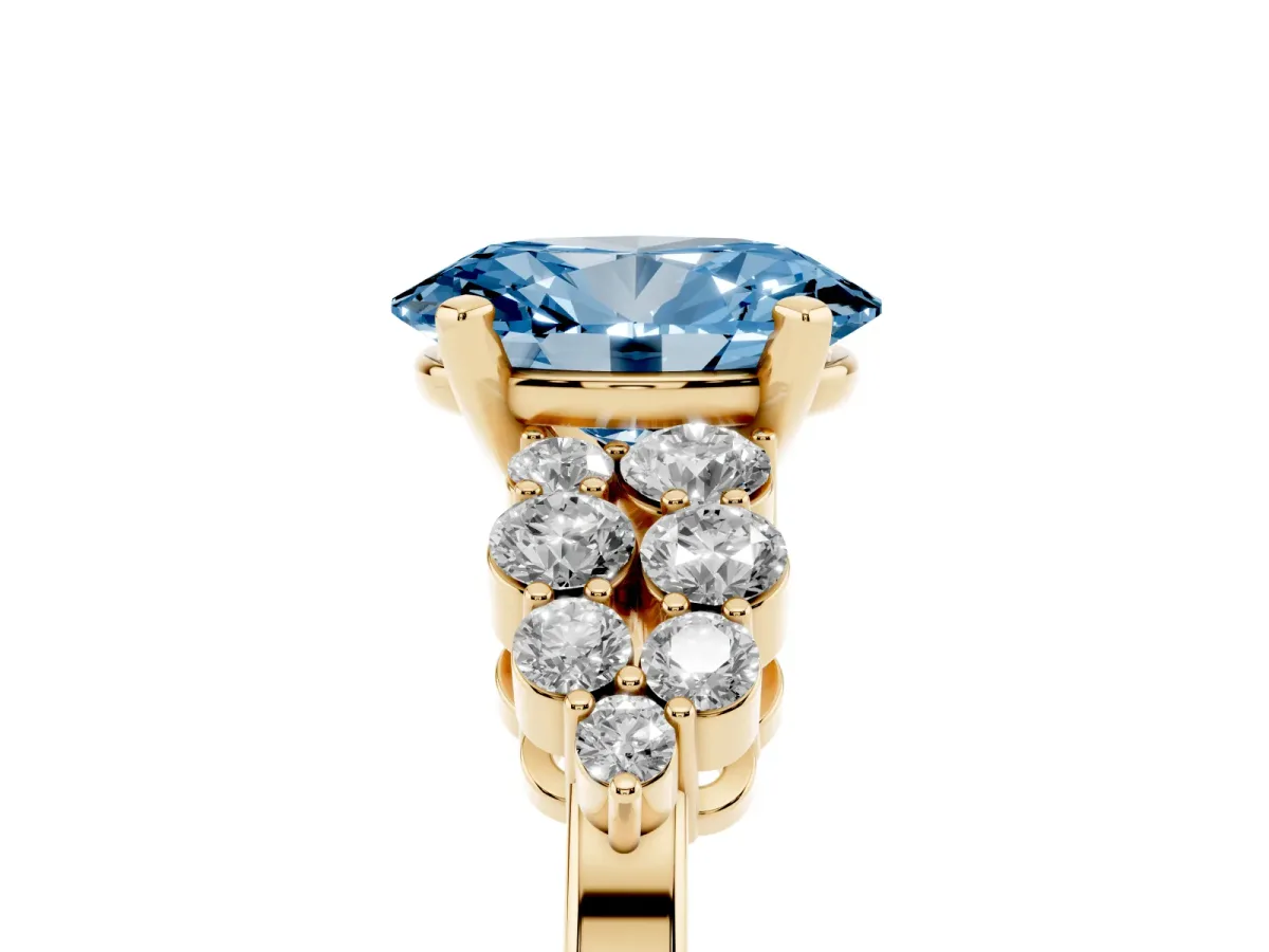 Fancy Blue Oval Cut Cluster Diamond Engagement Ring with Pavé Band and Four-Prong Setting Yellow gold