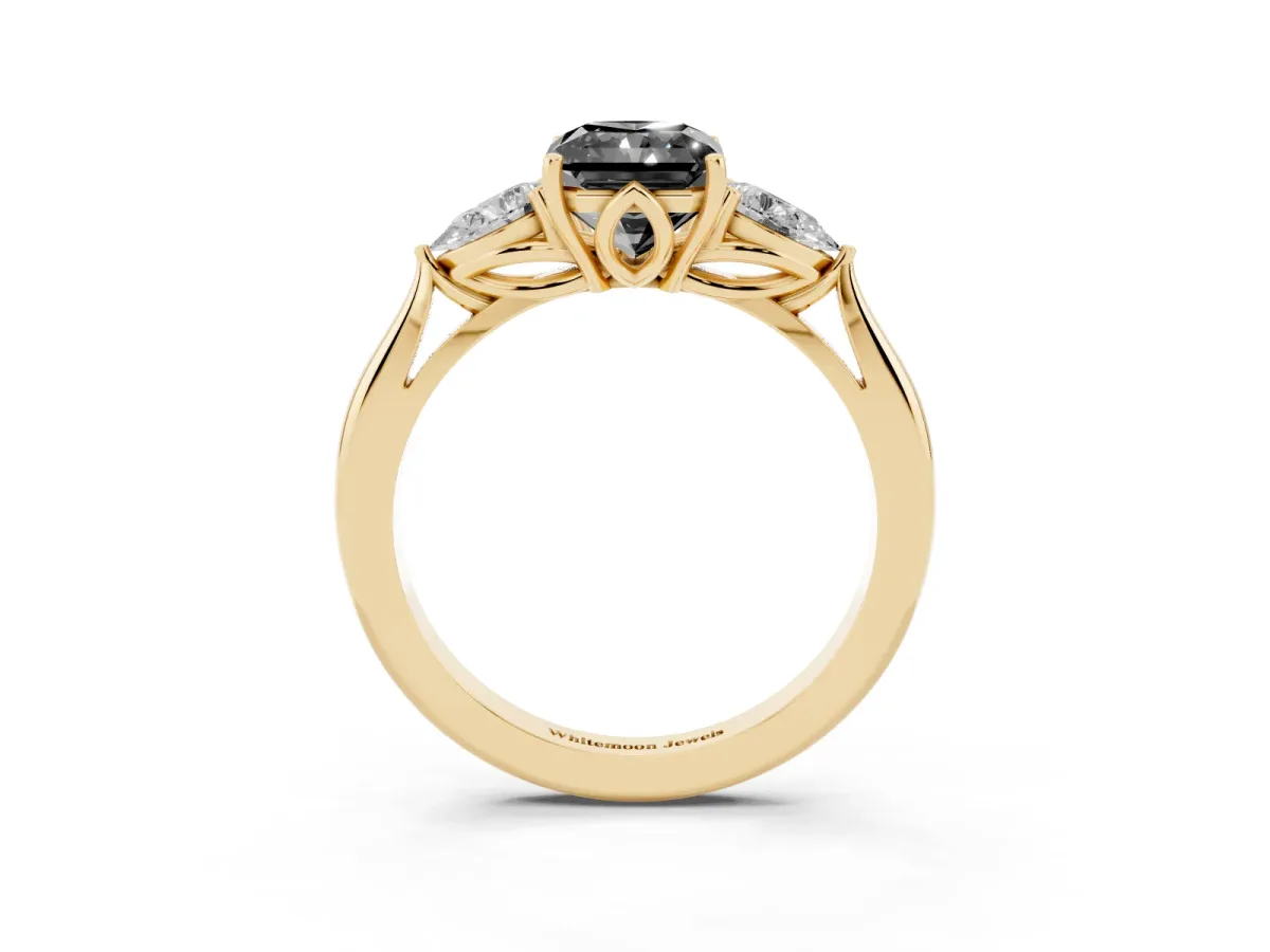 Fancy Black Radiant Cut Diamond Three-Stone Ring with Pear Side Stones and Prong Setting Yellow gold
