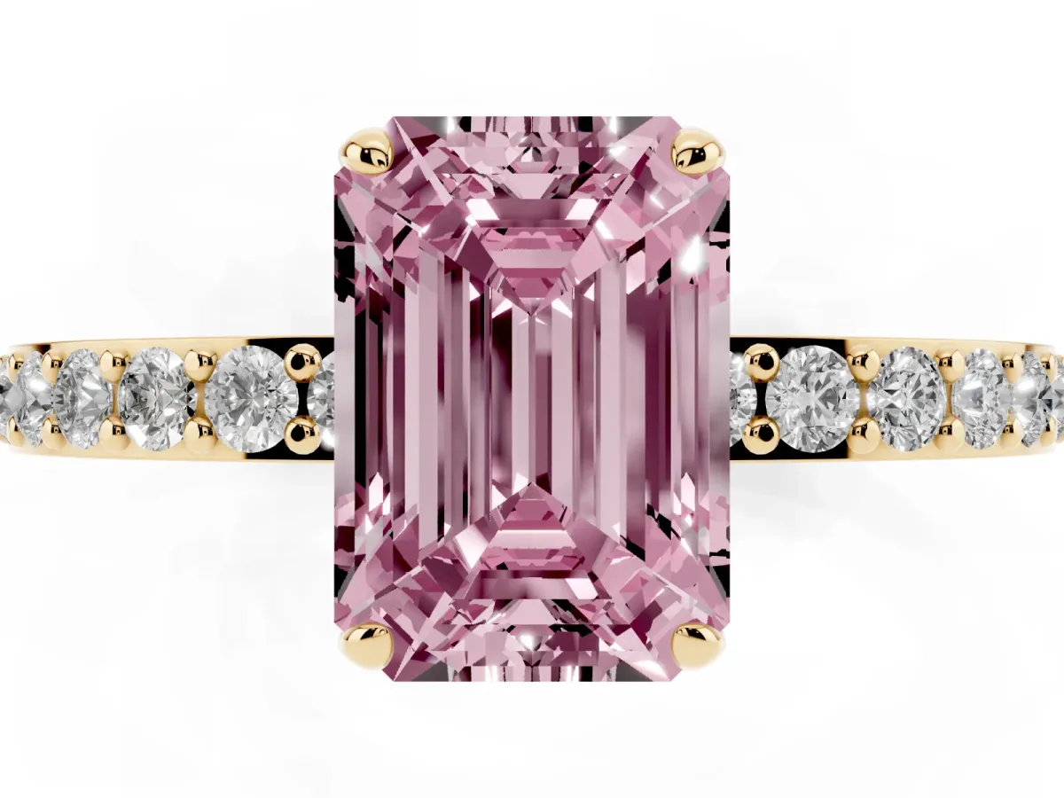 Fancy Pink Emerald Cut Diamond Solitaire Engagement Ring with Pavé Band and Four-Prong Setting Yellow gold