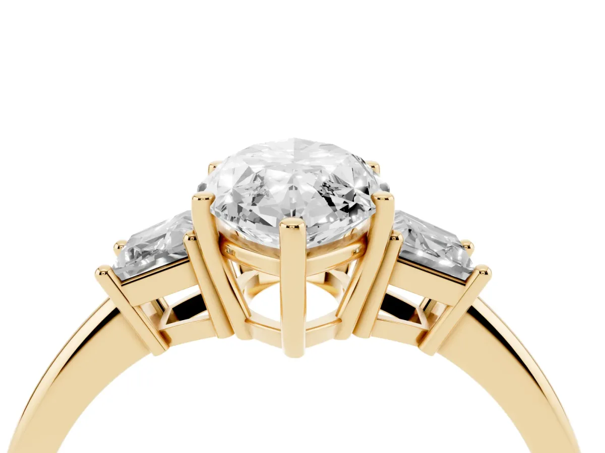 Marquise Cut Diamond Three-Stone Ring with Trapezoid Side Stones and Prong Setting Yellow gold
