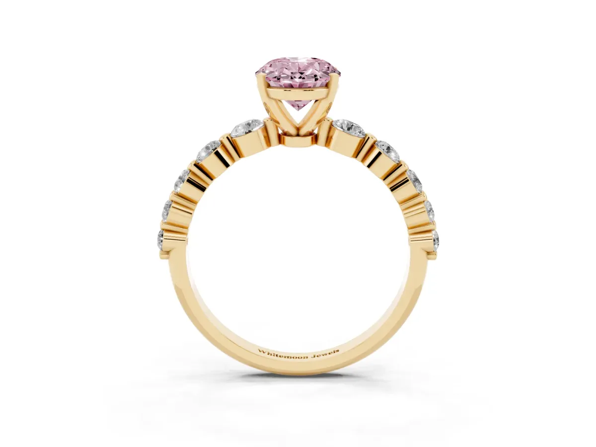 Fancy Pink Oval Cut Solitaire Diamond Ring with Pave Band and Four-Prong Setting Yellow gold