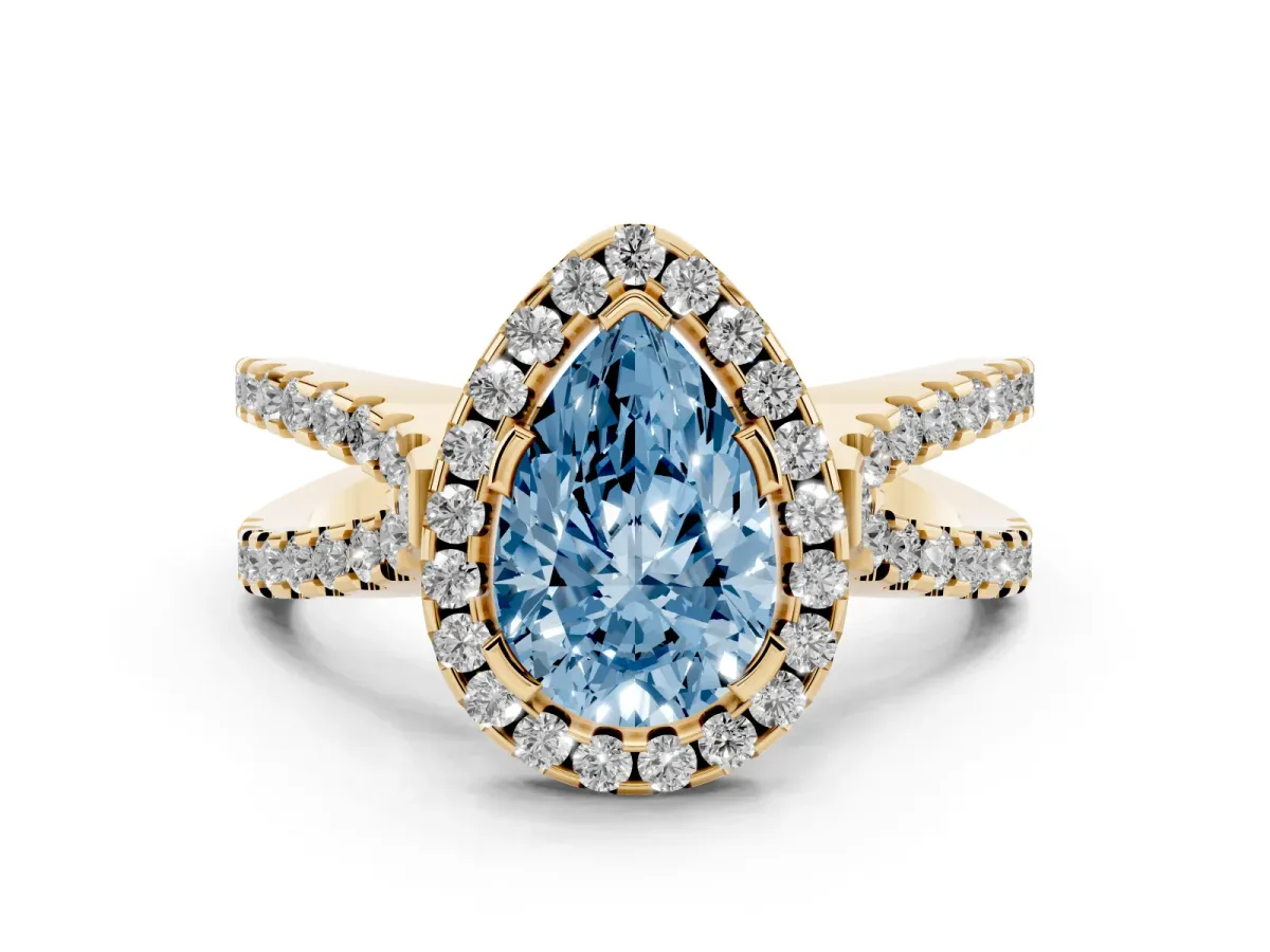Fancy Blue Pear Cut Diamond Halo Ring with Split Shank Pavé Band and Prong Setting Yellow gold