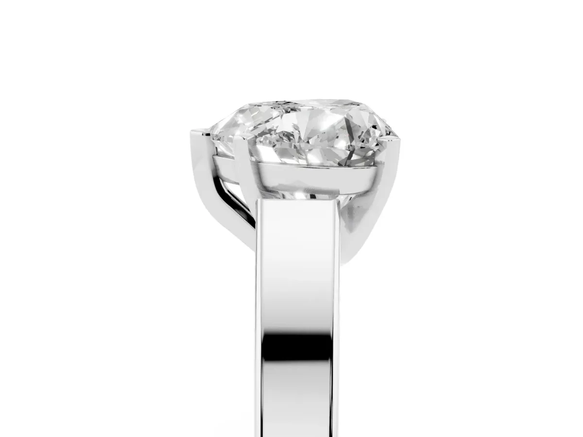Heart Cut Solitaire Engagement Ring with Four-Prong Setting and Tapered Band Silver