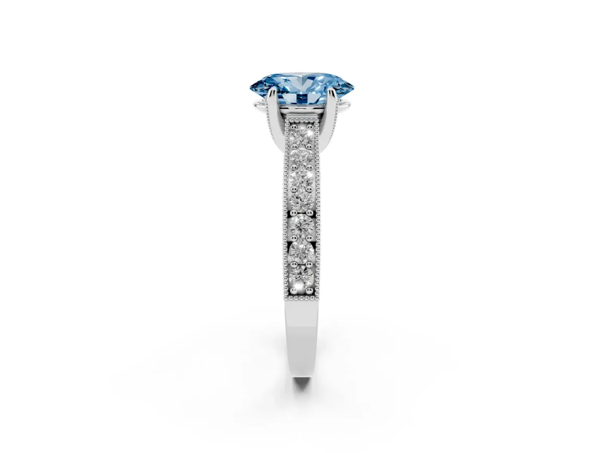 Fancy Blue Oval Cut Cut Diamond Solitaire Ring with Milgrain Pave Band and Four Prong Setting Silver