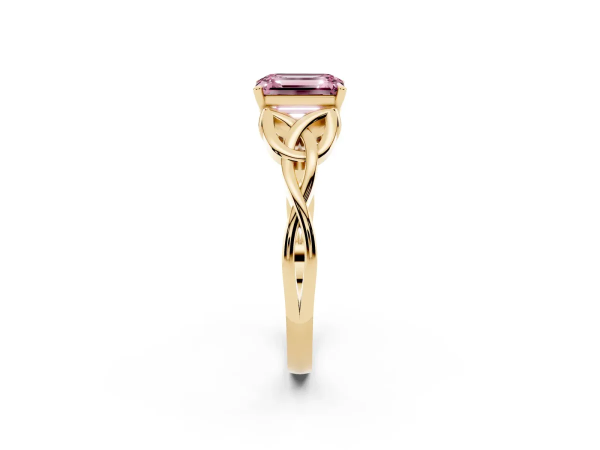 Fancy Pink Emerald Cut Diamond Solitaire Engagement Ring with Celtic Knot Band and Four-Prong Setting Yellow gold