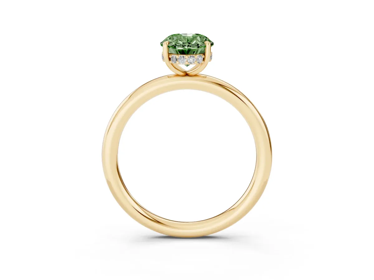 Fancy Green Oval Cut Diamond Solitaire Ring with Thin Band and Four-Prong Setting Yellow gold