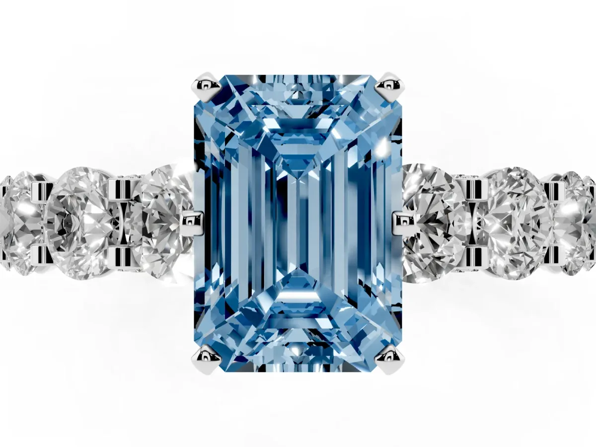 Fancy Blue Emerald Cut Diamond Side Stone Engagement Ring with Four-Prong Setting Silver