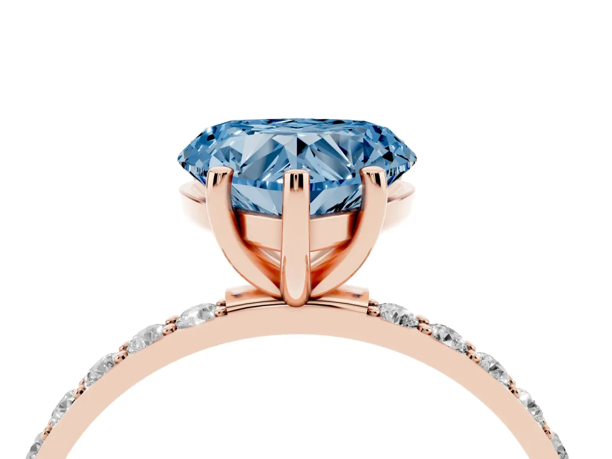 Fancy Blue Heart Cut Diamond Solitaire Ring with Round Pavé Shoulders and Prong Setting Rose gold