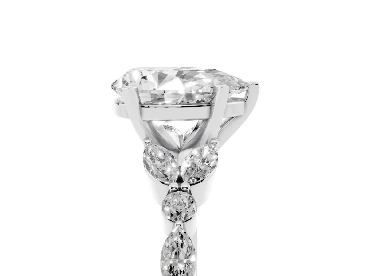 Pear Cut Diamond Solitaire Ring with Side Stones and Four-Prong Setting Silver