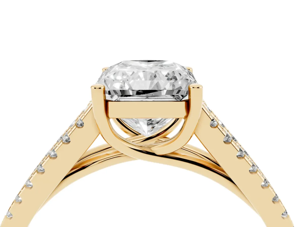 Radiant Cut Diamond Solitaire Engagement Ring with Split Shank Pavé Band Yellow gold