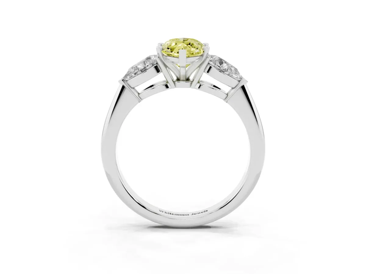 Fancy Yellow Three-Stone Marquise Cut Diamond Ring with Pear Side Stones and Four-Prong Setting Platinum