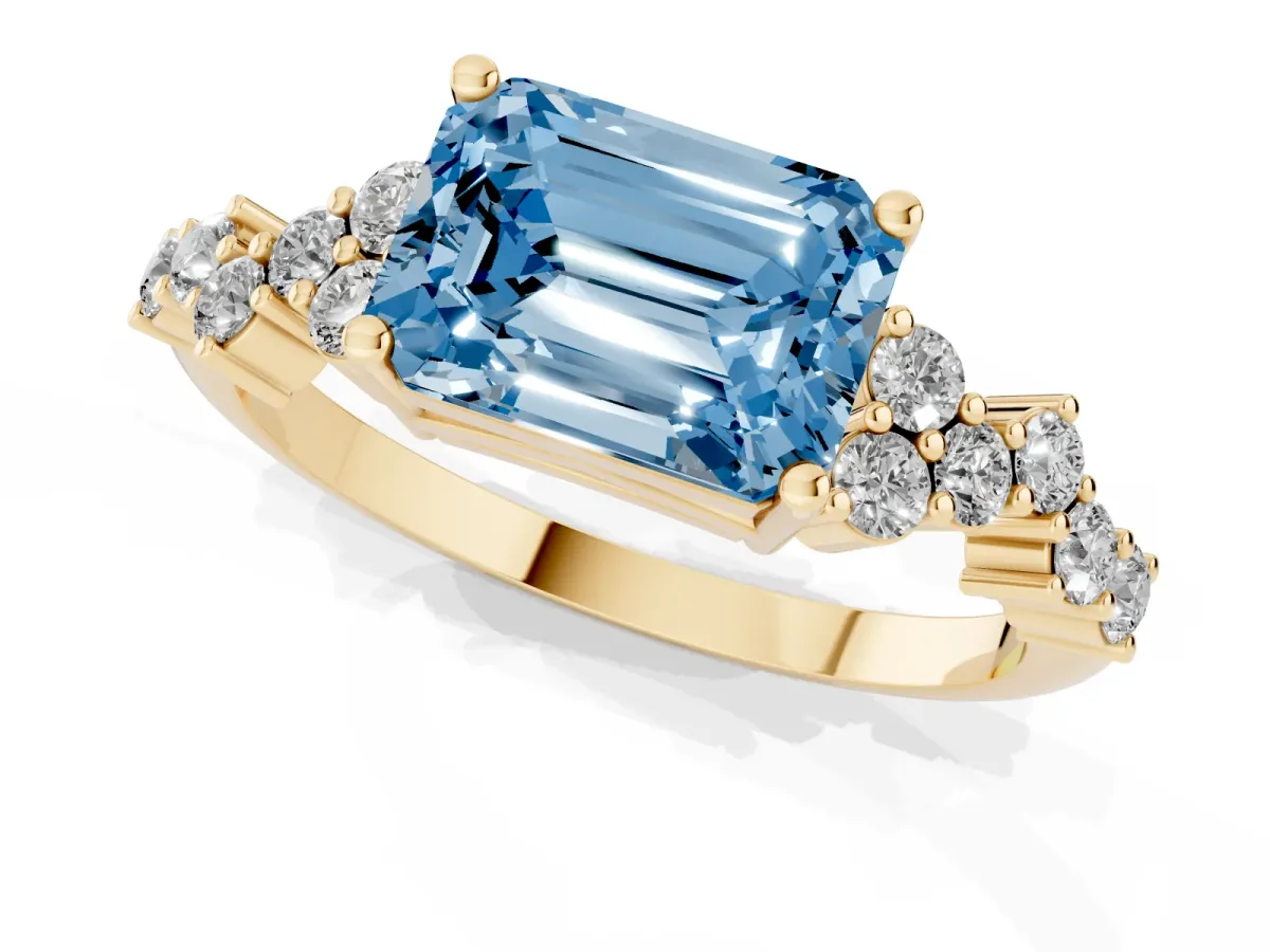 Fancy Blue Emerald Cut Diamond Scattered Round Accent Ring with Prong Setting Yellow gold